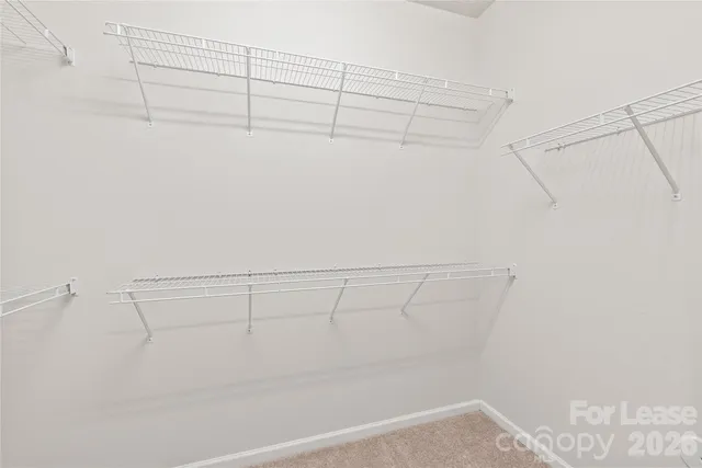 a view of a room with racks on the wall