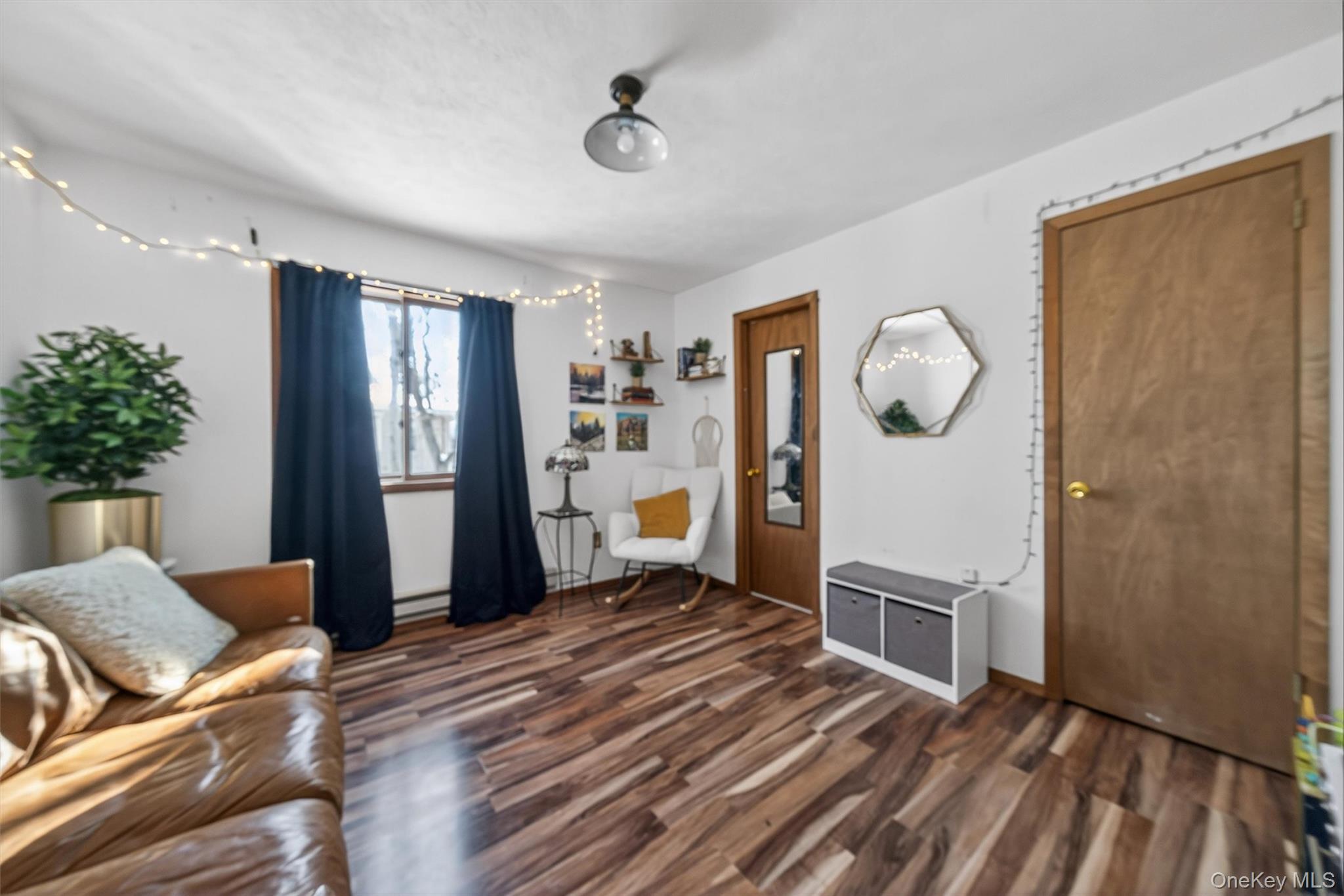 3111 Cherry Ridge Road Bushkill, PA 18324 - Photo 15 of 29 Living room with dark wood-style flooring