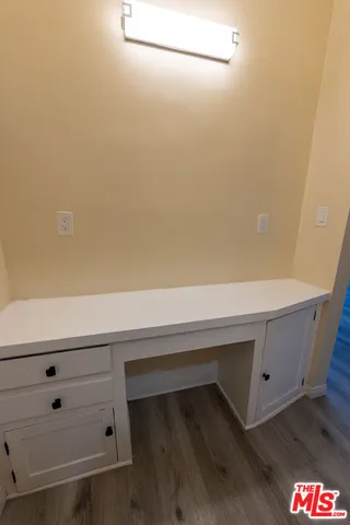 a room with a desk and chair