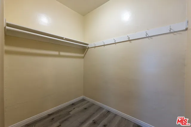 a view of small space with racks on the wall