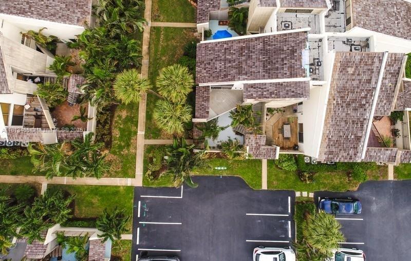 1605 Highway 1, Unit 10H Jupiter, FL 33477 - Photo 25 of 31 an aerial view of a house with a yard basket ball court and outdoor seating