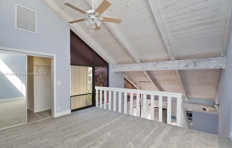 1605 Highway 1, Unit 10H Jupiter, FL 33477 - Photo 10 of 31 wooden floor in an empty room