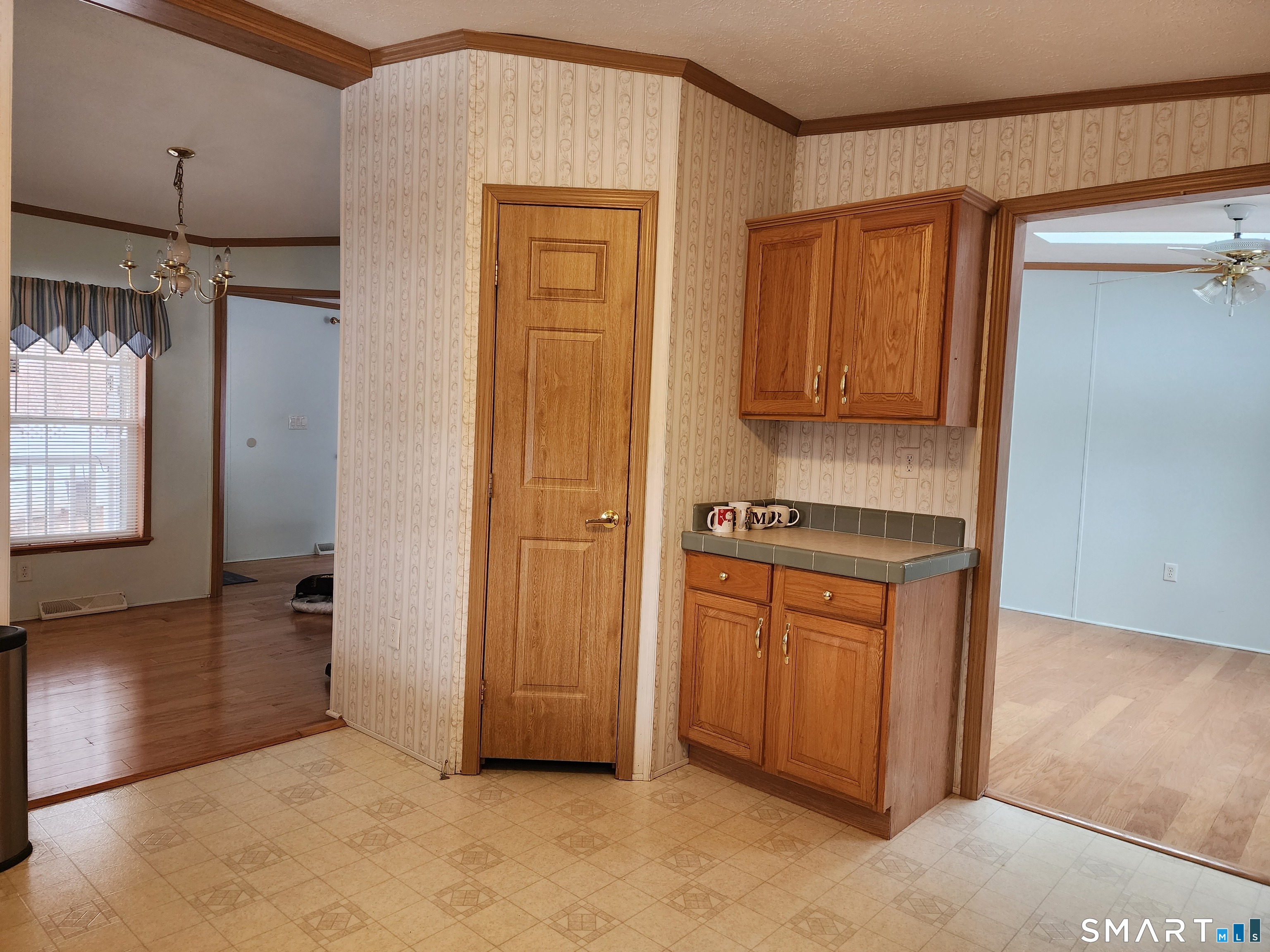 43 Evergreen Park Clinton, CT 06413 - Photo 11 of 43 a view of kitchen with granite countertop cabinets and black appliances