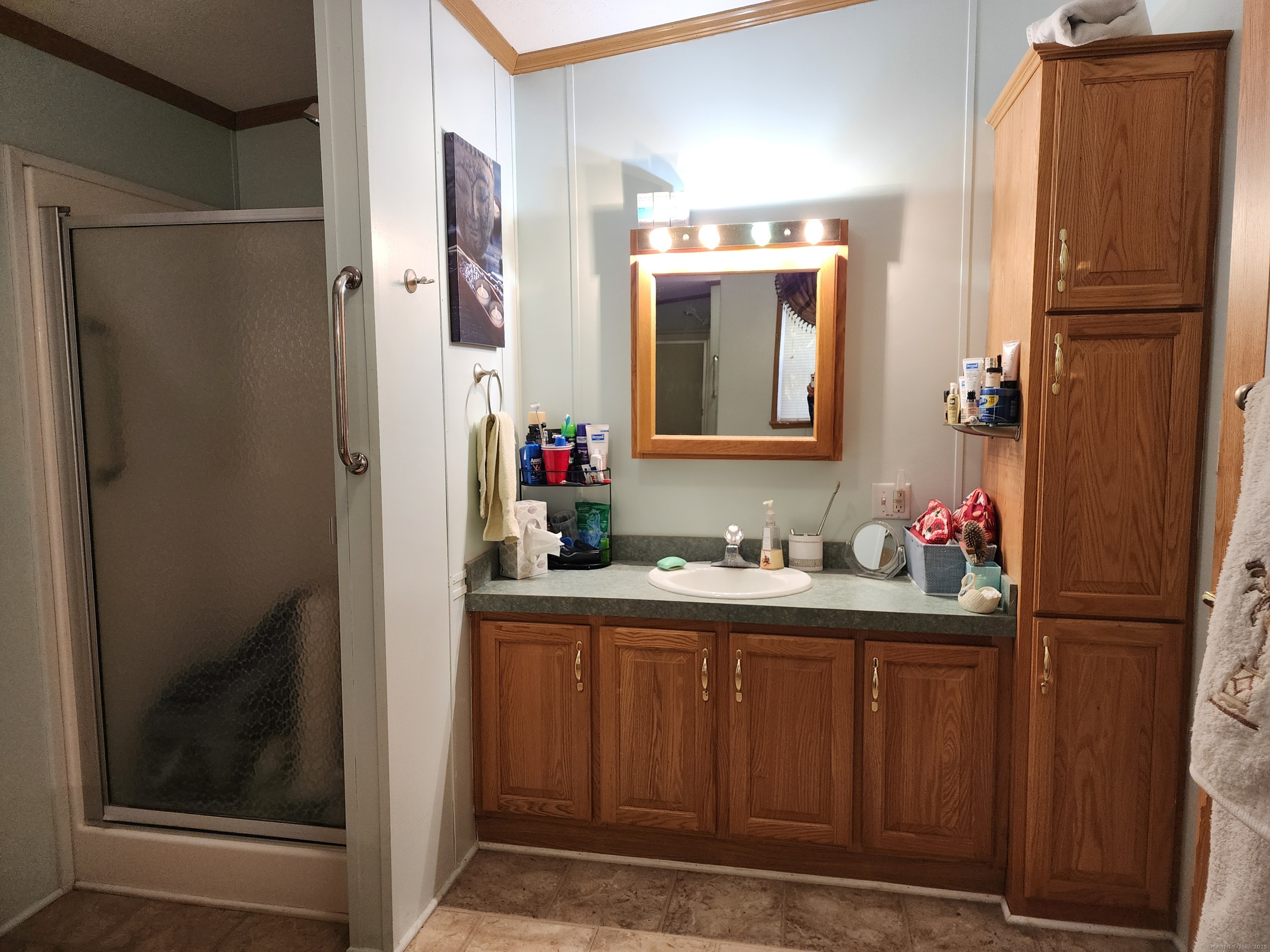 43 Evergreen Park Clinton, CT 06413 - Photo 26 of 43 a bathroom with a sink vanity and mirror