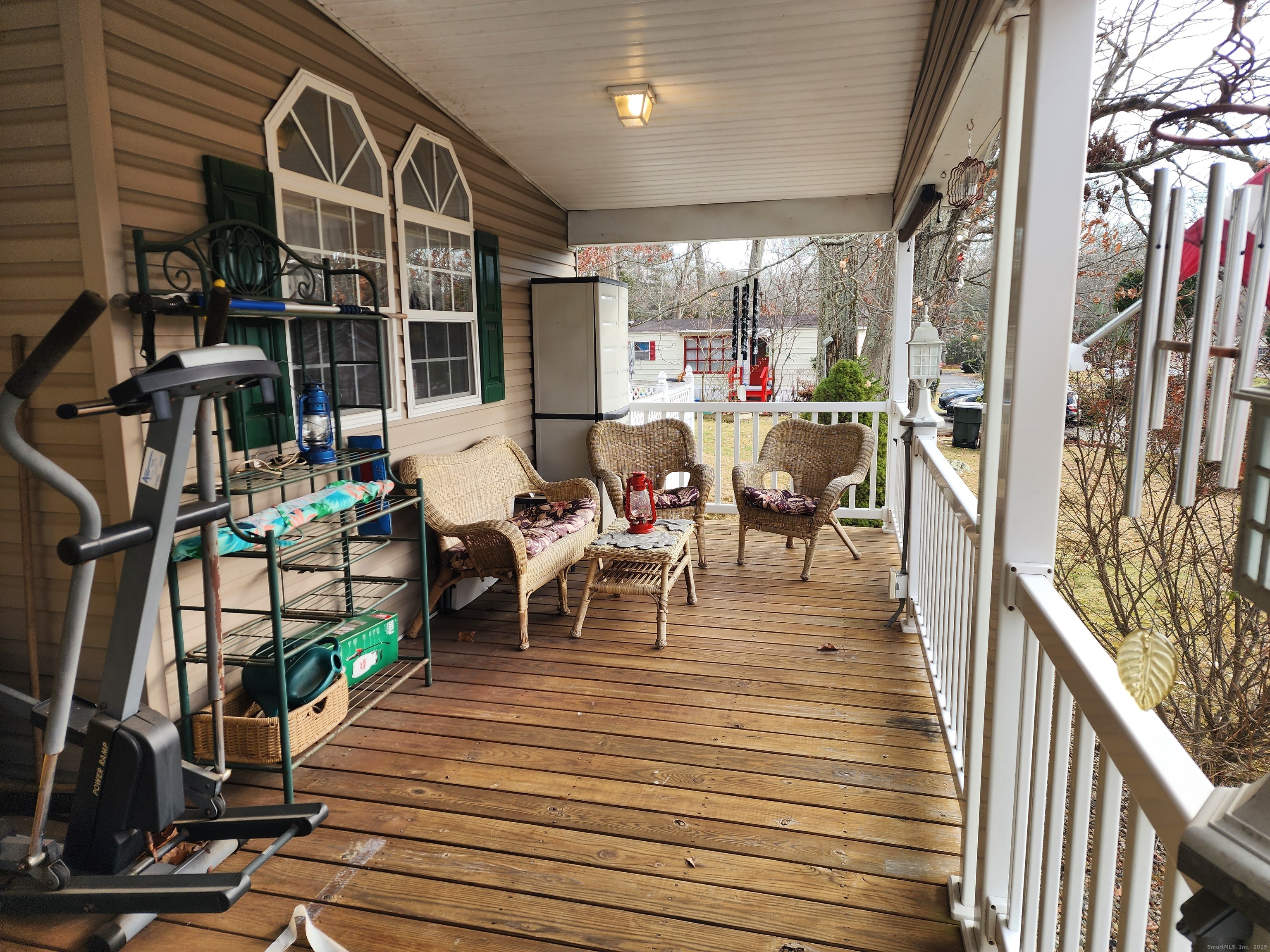 43 Evergreen Park Clinton, CT 06413 - Photo 33 of 43 a view of a patio with dining table and chairs