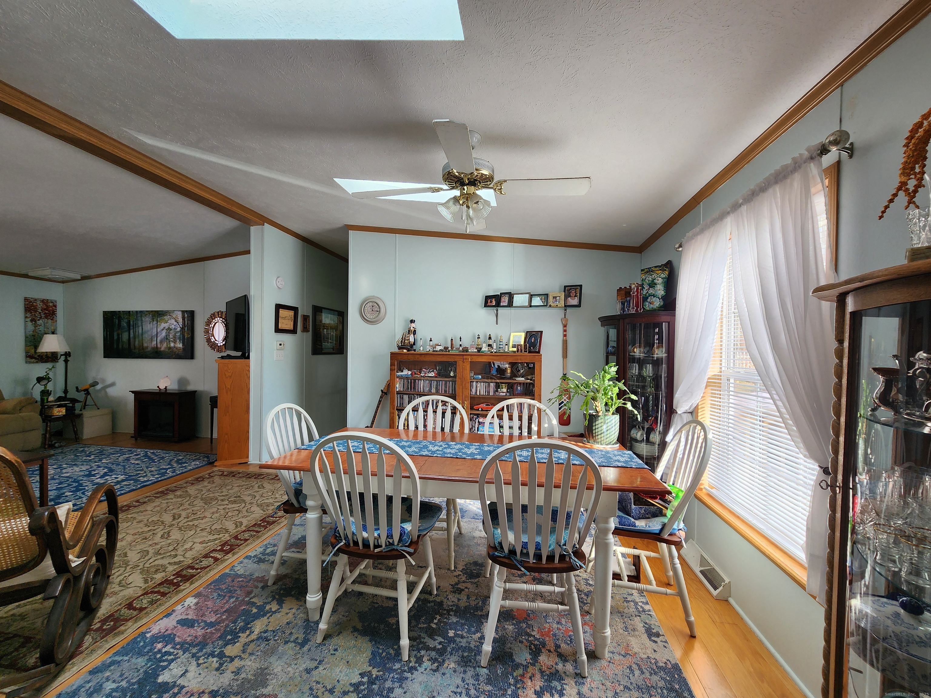 43 Evergreen Park Clinton, CT 06413 - Photo 41 of 43 a view of a dining room with furniture