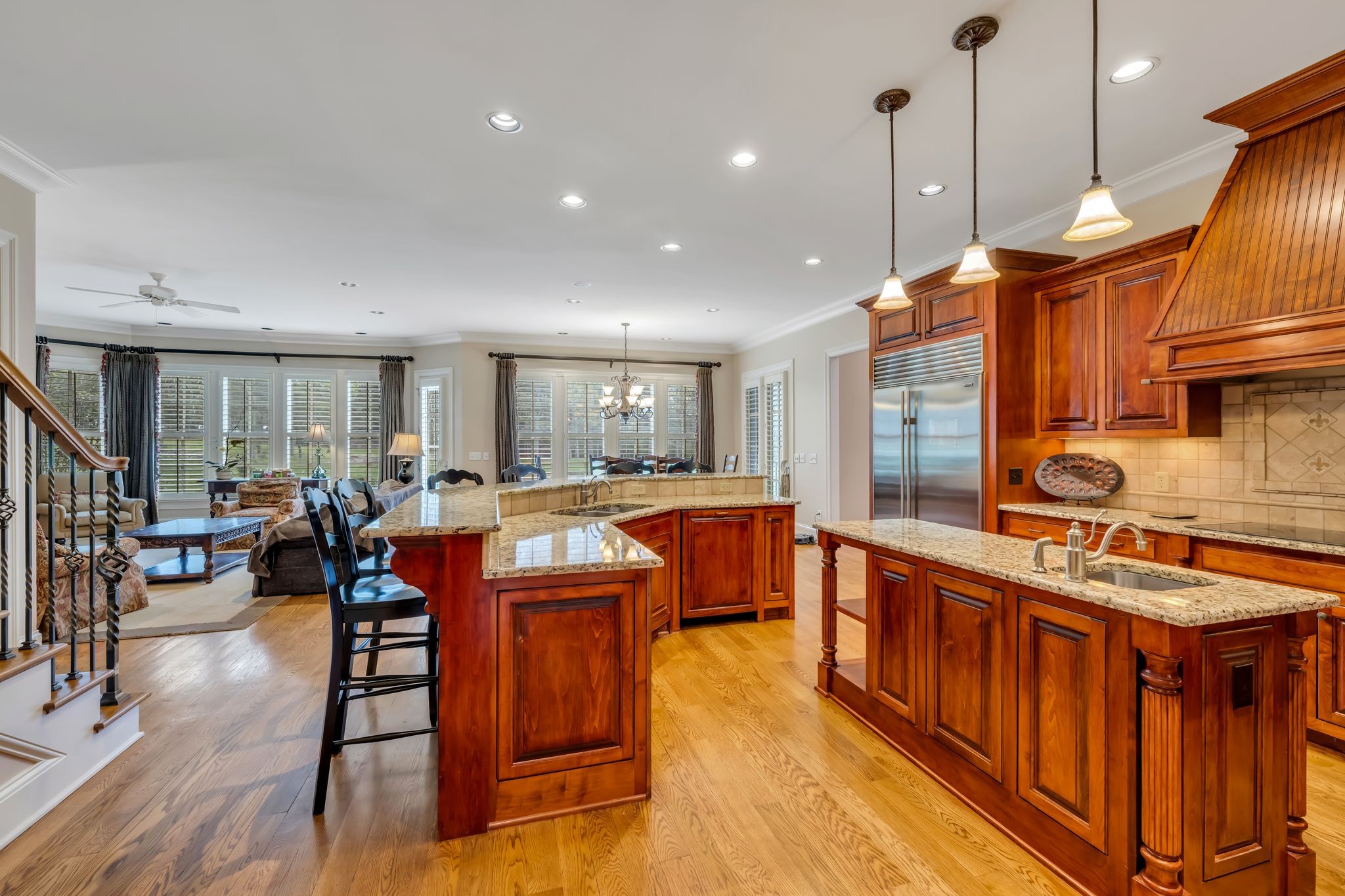 1191 Waterstone Boulevard Franklin, TN 37069 - Photo 11 of 32 a large kitchen with lots of counter space and a table