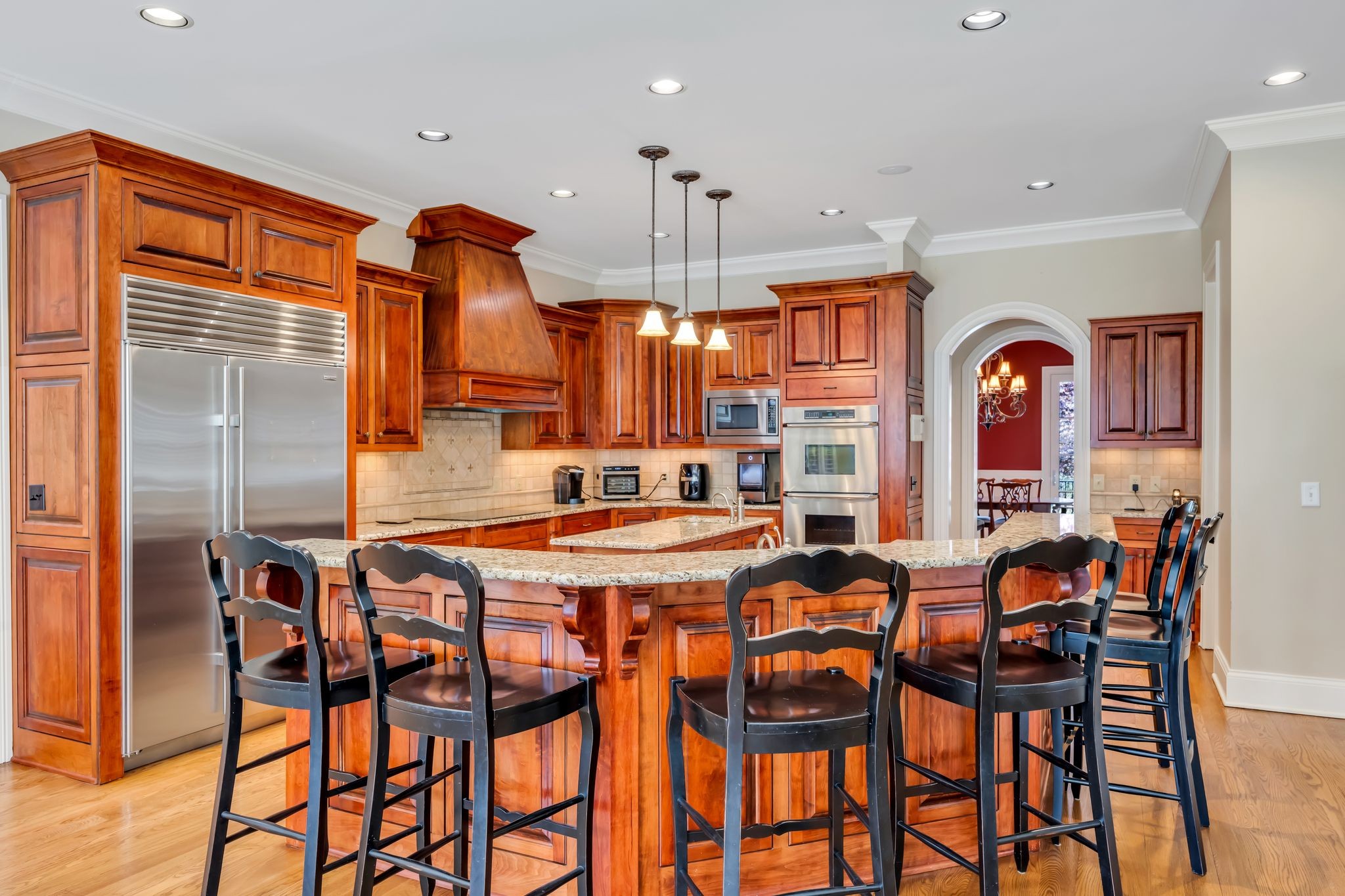 1191 Waterstone Boulevard Franklin, TN 37069 - Photo 14 of 32 a dining table chairs and a chandelier