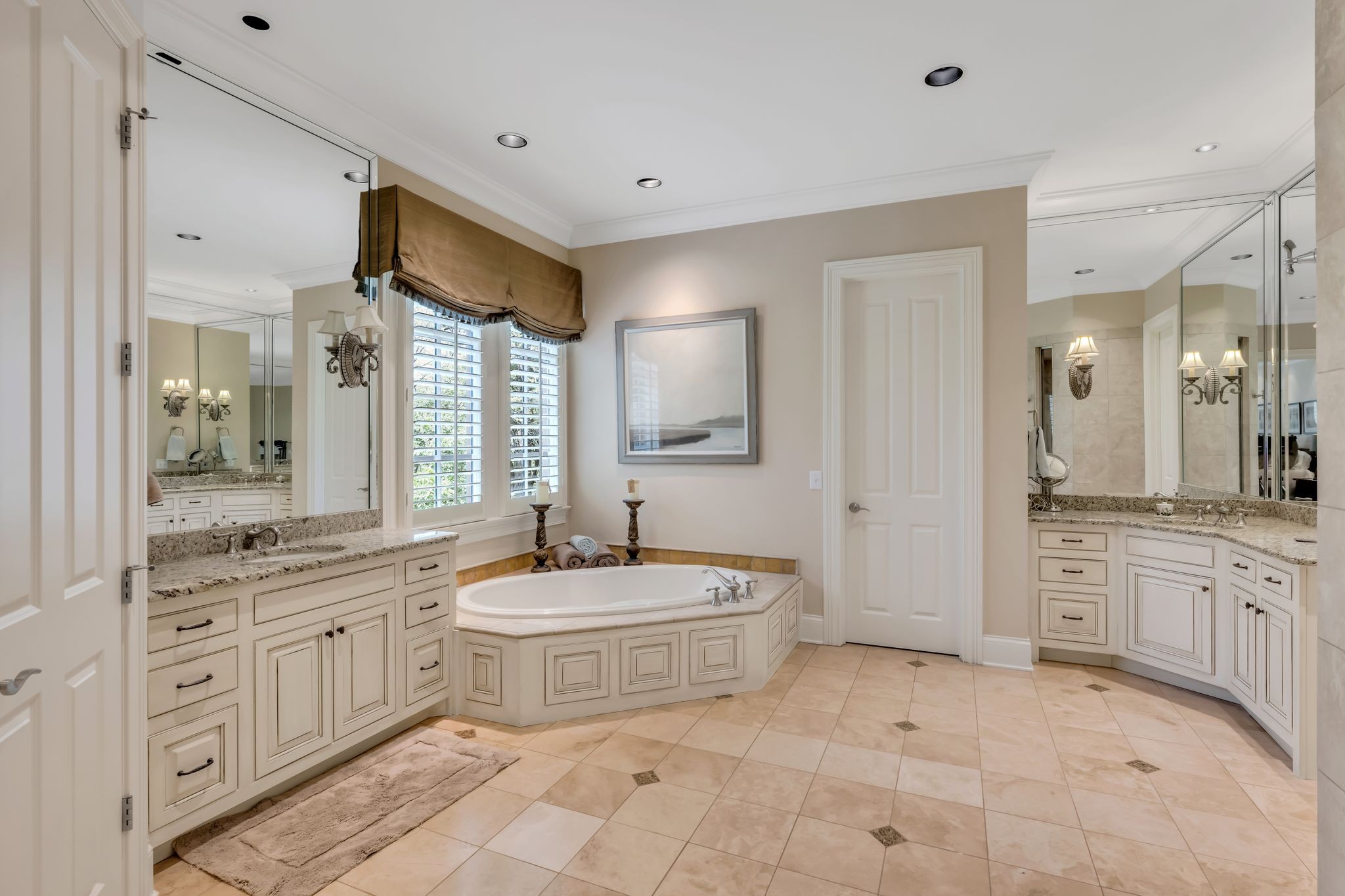 1191 Waterstone Boulevard Franklin, TN 37069 - Photo 18 of 32 a spacious bathroom with a double vanity sink a mirror a bathtub and next to a window