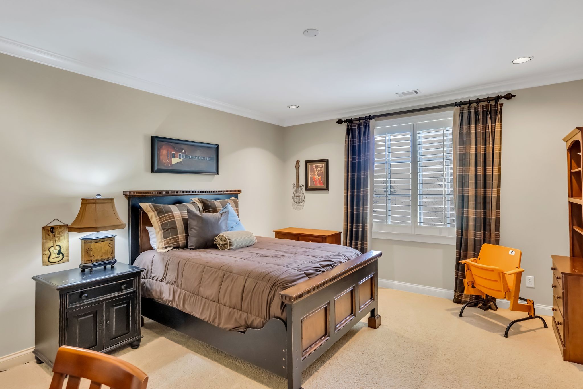 1191 Waterstone Boulevard Franklin, TN 37069 - Photo 24 of 32 a bedroom with a bed and dresser