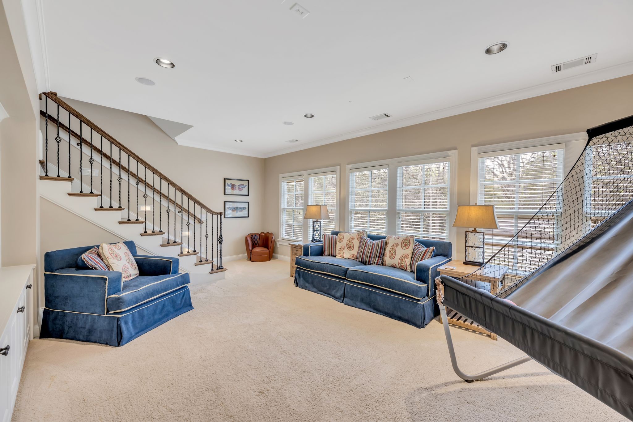1191 Waterstone Boulevard Franklin, TN 37069 - Photo 25 of 32 a living room with furniture and a potted plant