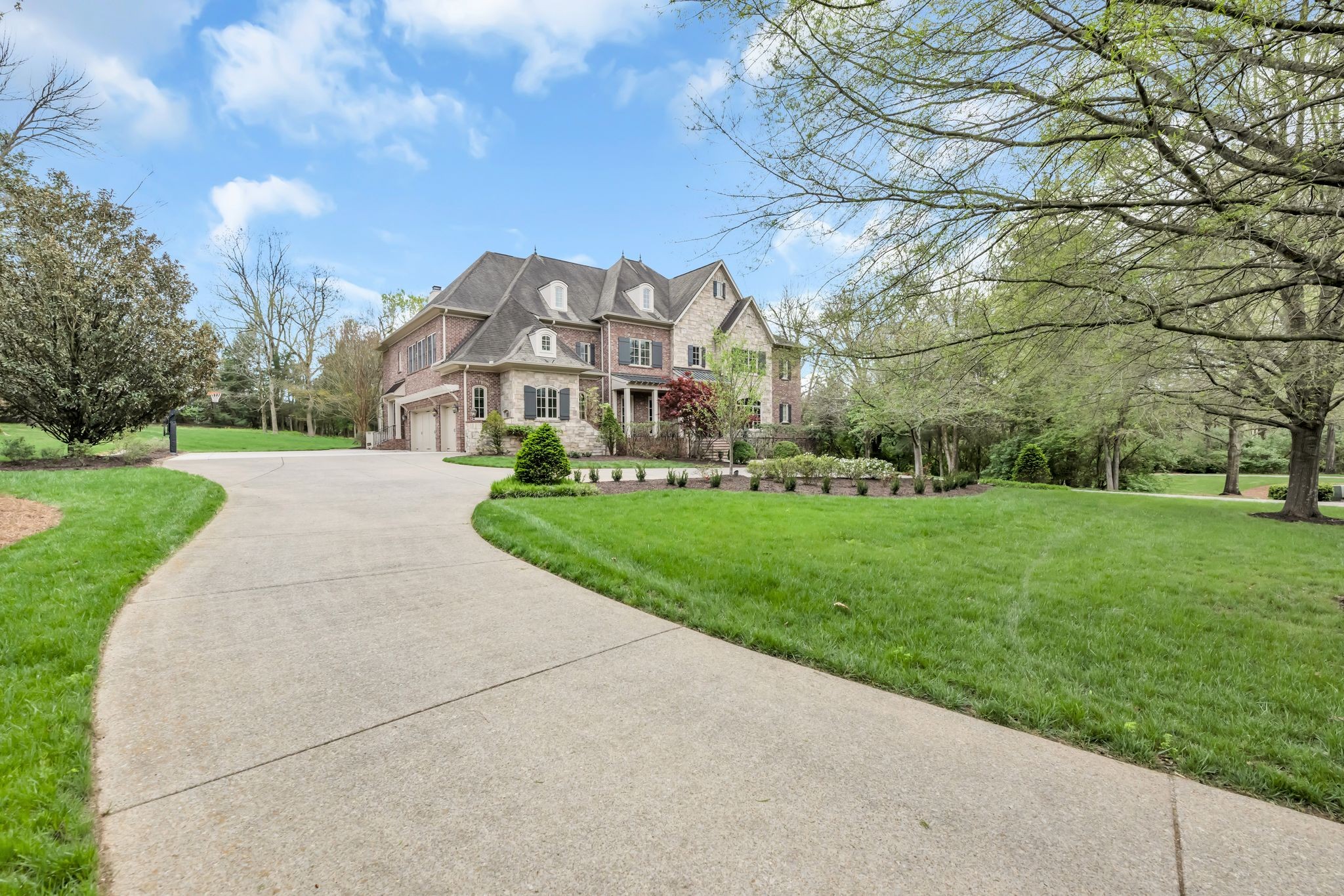 1191 Waterstone Boulevard Franklin, TN 37069 - Photo 3 of 32 a front view of house with yard