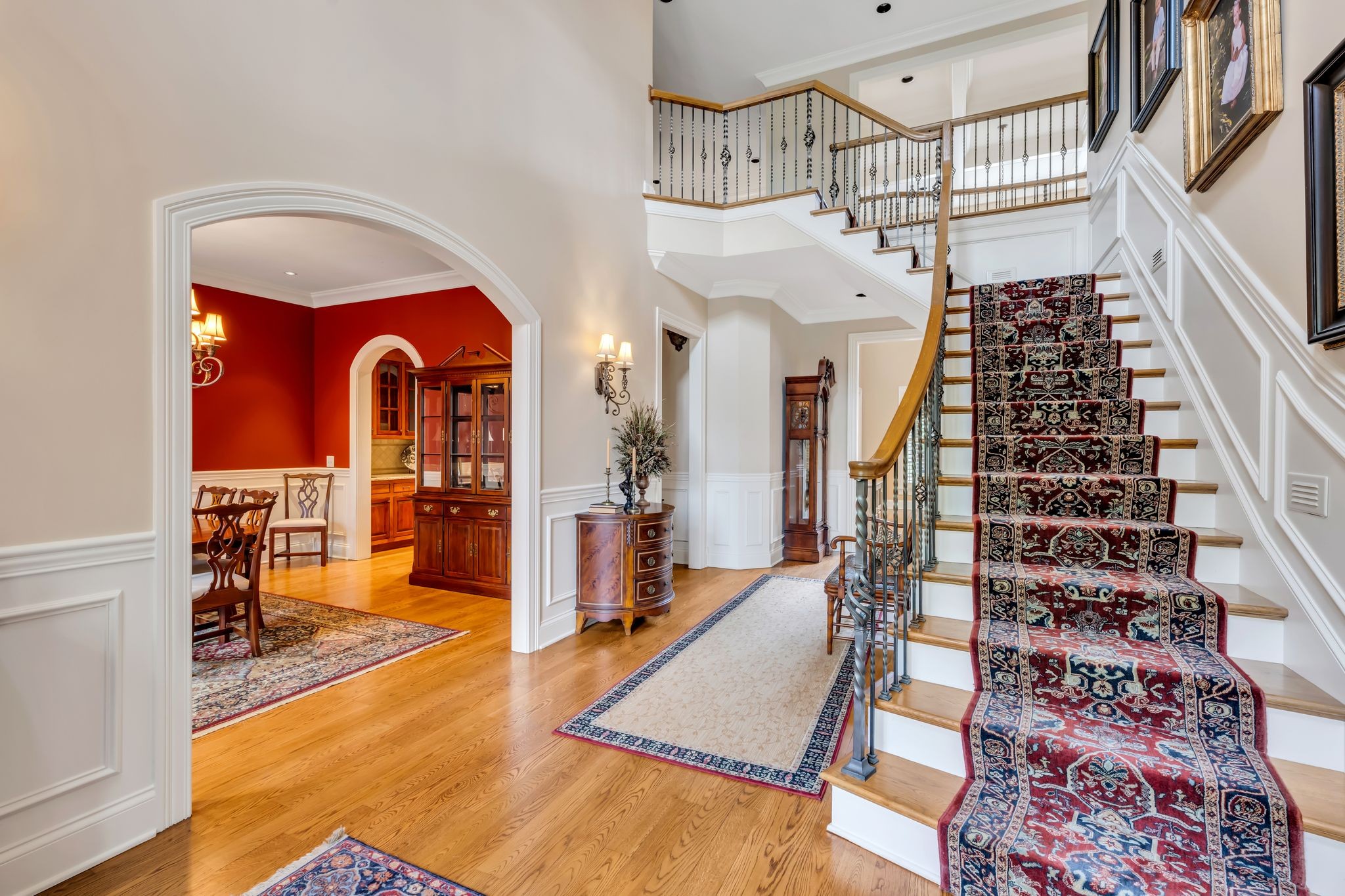 1191 Waterstone Boulevard Franklin, TN 37069 - Photo 6 of 32 wooden floor in an empty room with a fireplace