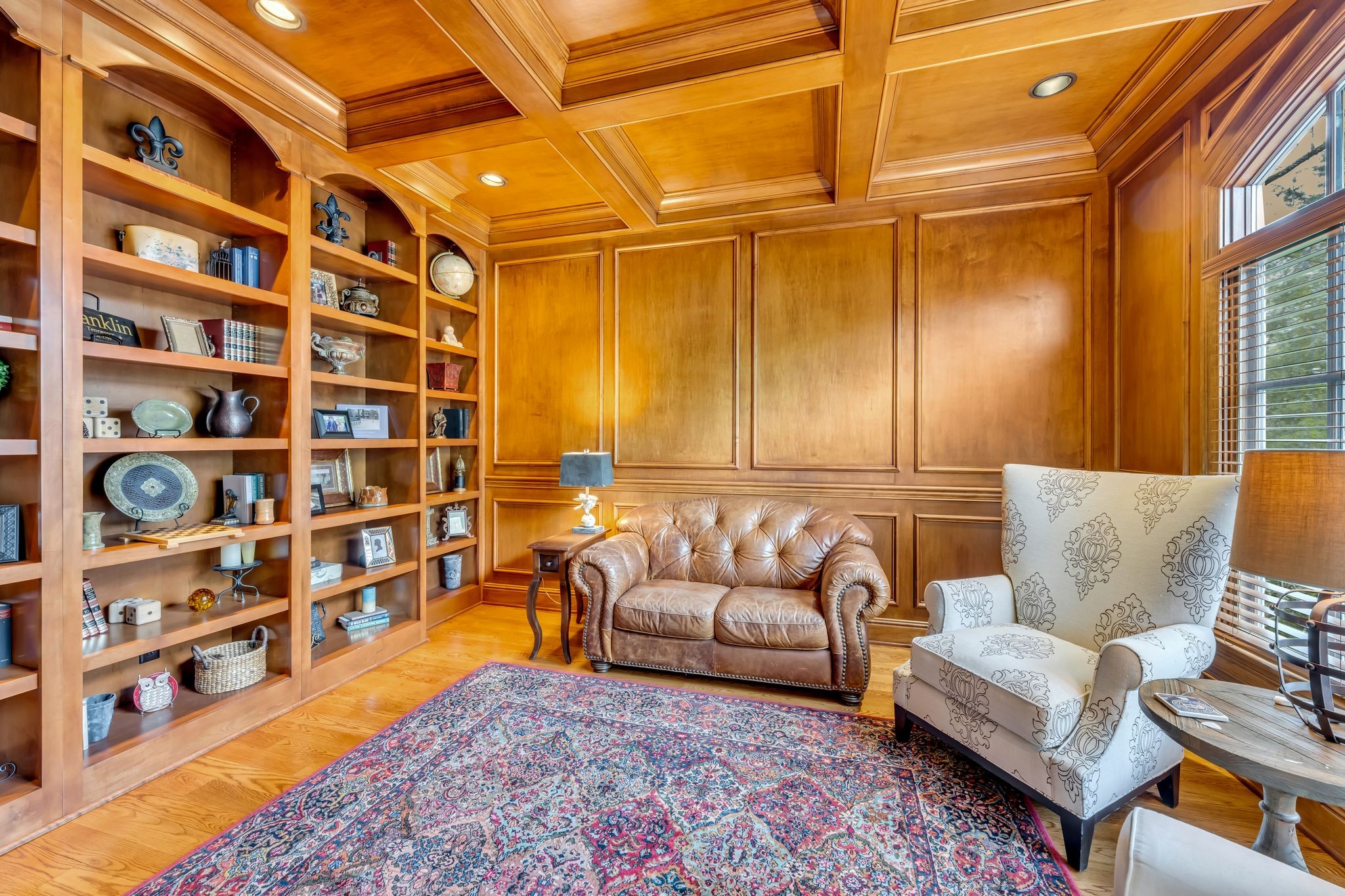 1191 Waterstone Boulevard Franklin, TN 37069 - Photo 8 of 32 a living room with furniture cabinets and a rug