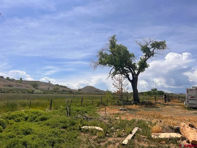 a view of a lake with a mountain in the background