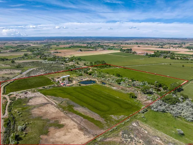 a view of a city with an ocean