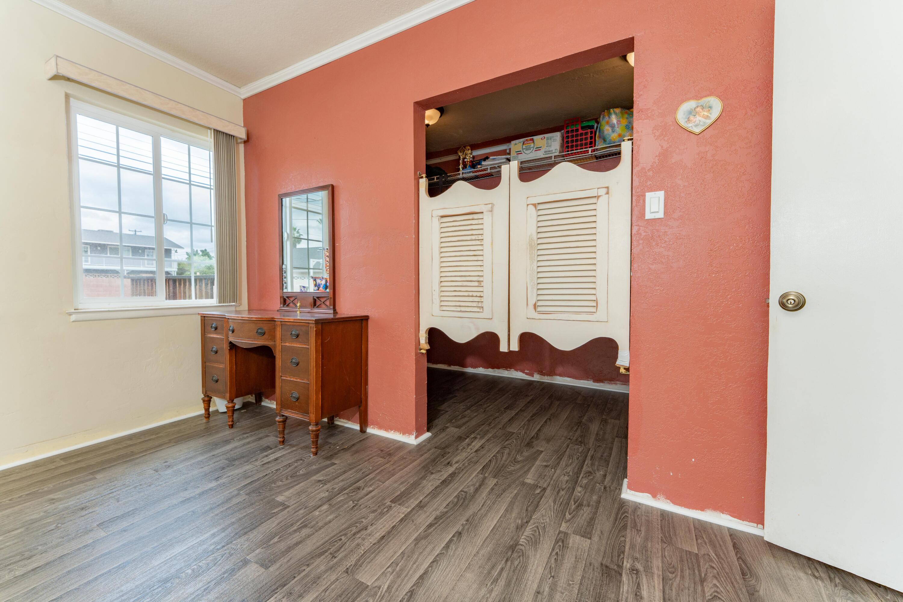 570 North Birch Avenue Reedley, CA 93654 - Photo 30 of 52 a view of a room with wooden floor and furniture