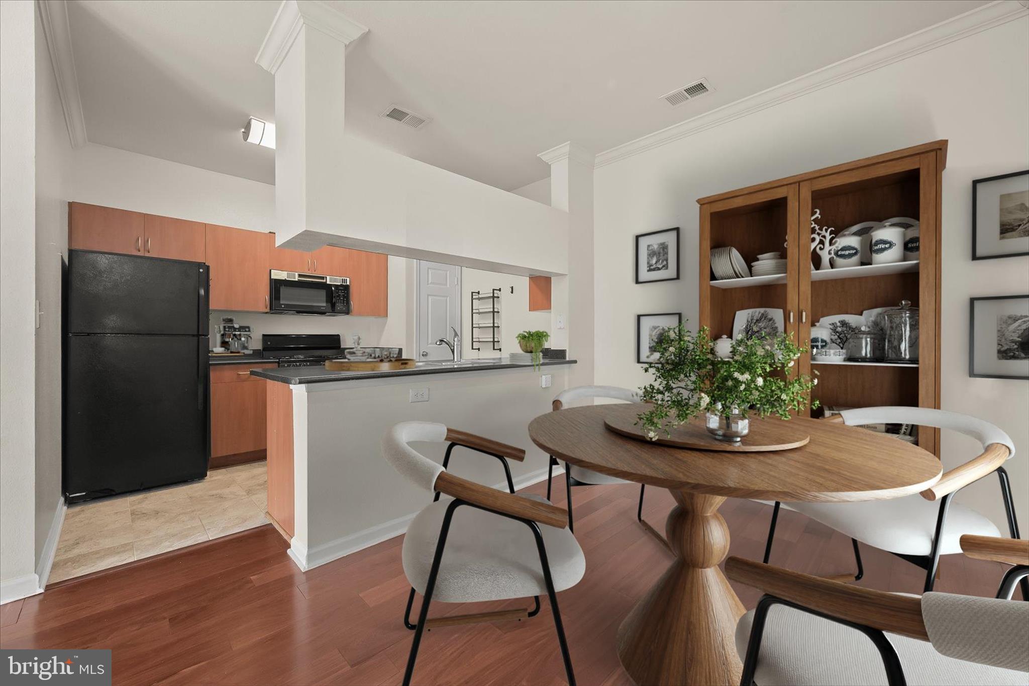 19620 Galway Bay Circle, Unit 302 Germantown, MD 20874 - Photo 3 of 36 a dining room with furniture and window