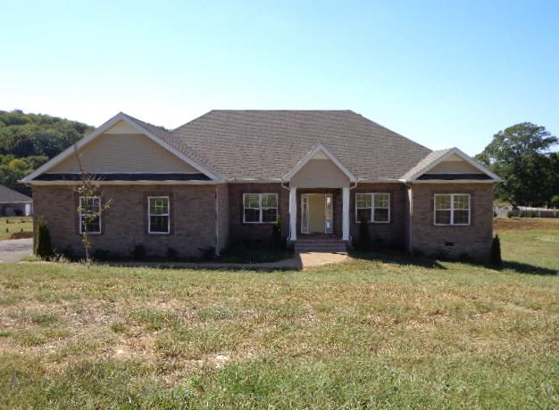 1455 Cliff Amos Road Spring Hill, TN 37174 - Photo 1 of 24 a view of a house with a yard