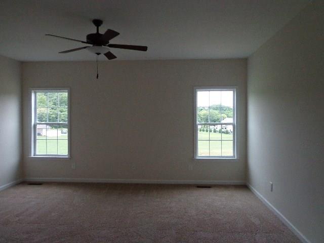 1455 Cliff Amos Road Spring Hill, TN 37174 - Photo 13 of 24 a view of an empty room with a window