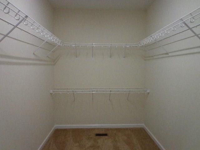1455 Cliff Amos Road Spring Hill, TN 37174 - Photo 17 of 24 a view of a room with racks on the wall