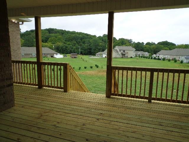 1455 Cliff Amos Road Spring Hill, TN 37174 - Photo 22 of 24 a view of a balcony with wooden floor