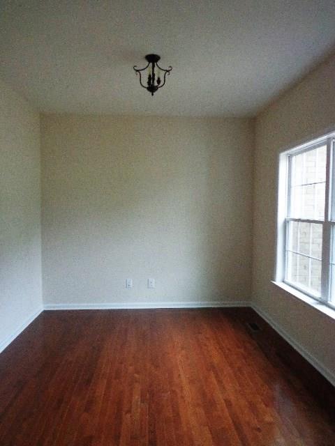 1455 Cliff Amos Road Spring Hill, TN 37174 - Photo 10 of 24 an empty room with a window