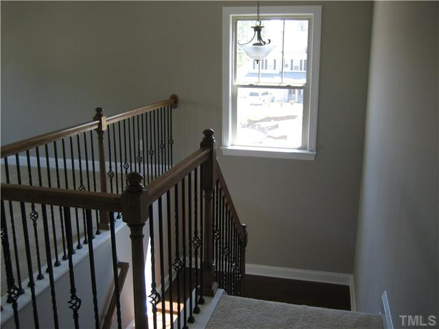 2204 Lower Lake Road Wake Forest, NC 27587 - Photo 13 of 24 Oak Stairs with Iron Railing, Just Beautiful