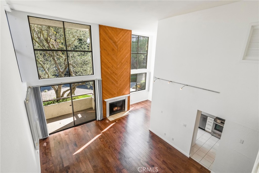 5987 Peacock Ridge Road, Unit 122 Rancho Palos Verdes, CA 90275 - Photo 17 of 31 a view of a living room with furniture and a window