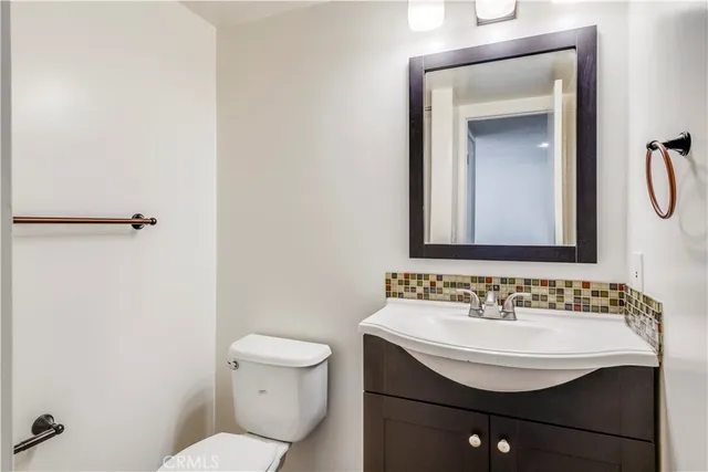 a bathroom with a sink and a toilet