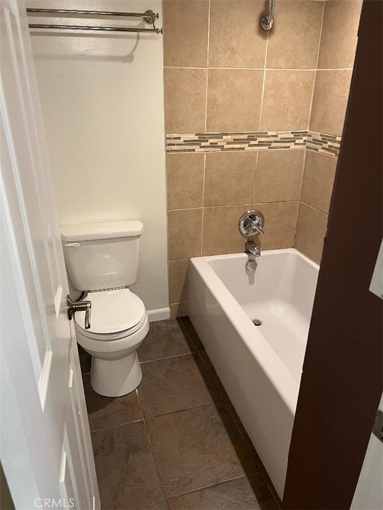 5987 Peacock Ridge Road, Unit 122 Rancho Palos Verdes, CA 90275 - Photo 19 of 31 a white toilet sitting next to a white sink