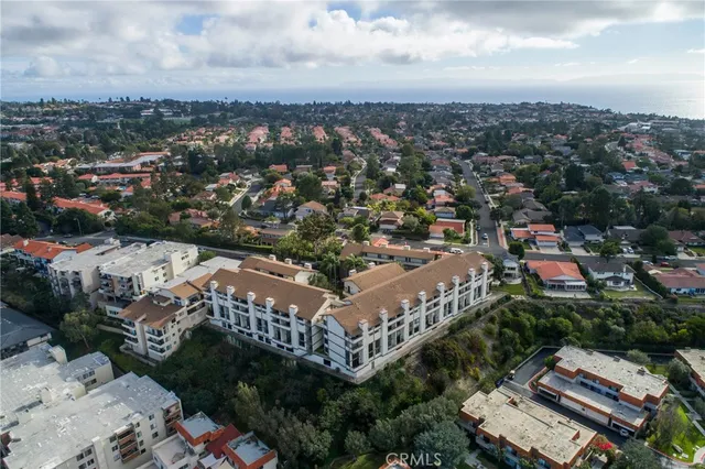 an aerial view of a house with a garden
