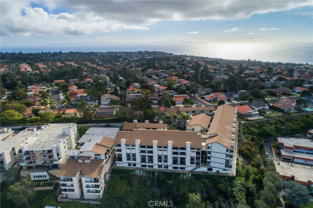 5987 Peacock Ridge Road, Unit 122 Rancho Palos Verdes, CA 90275 - Photo 28 of 31 an aerial view of a house with a lake view
