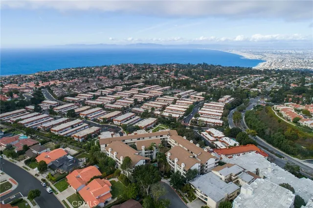 an aerial view of a city with lots of residential buildings