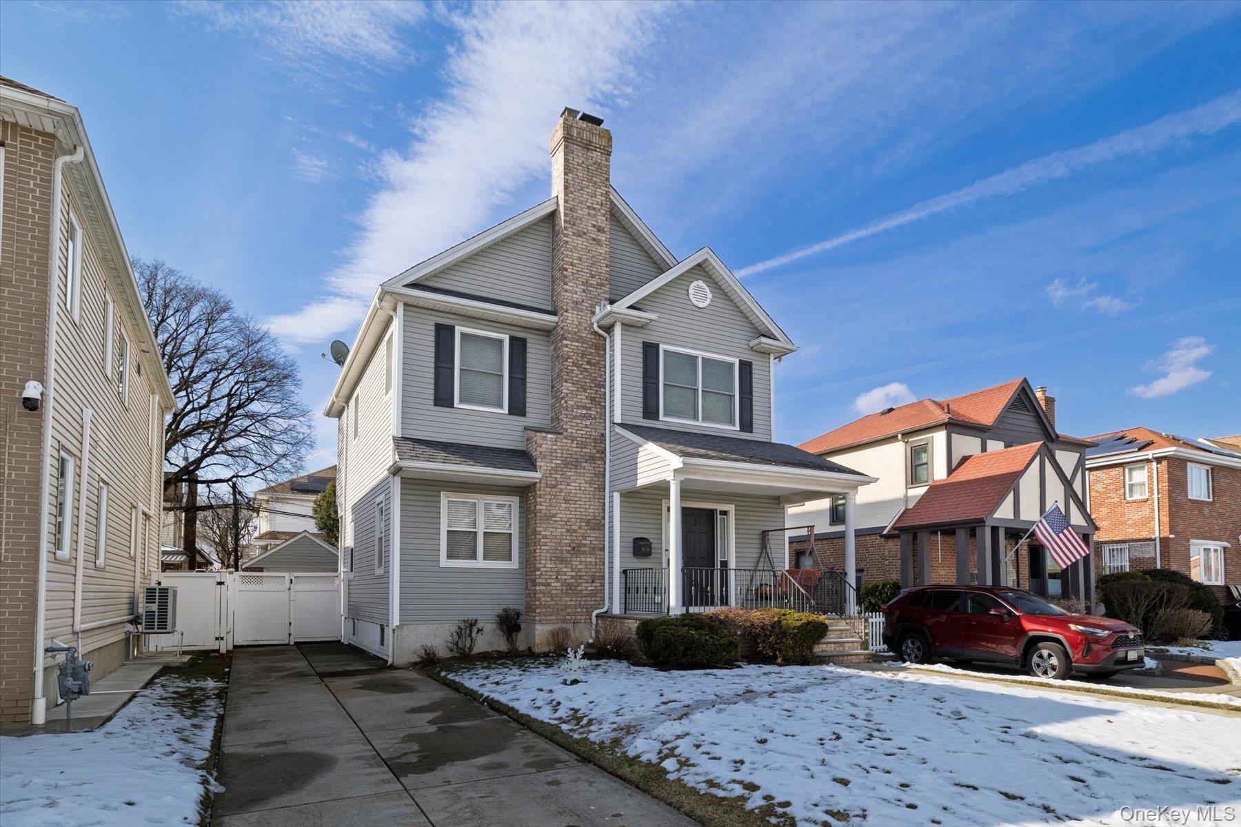 84-24 252nd Street Queens, NY 11426 - Photo 2 of 24 a front view of a house with a yard