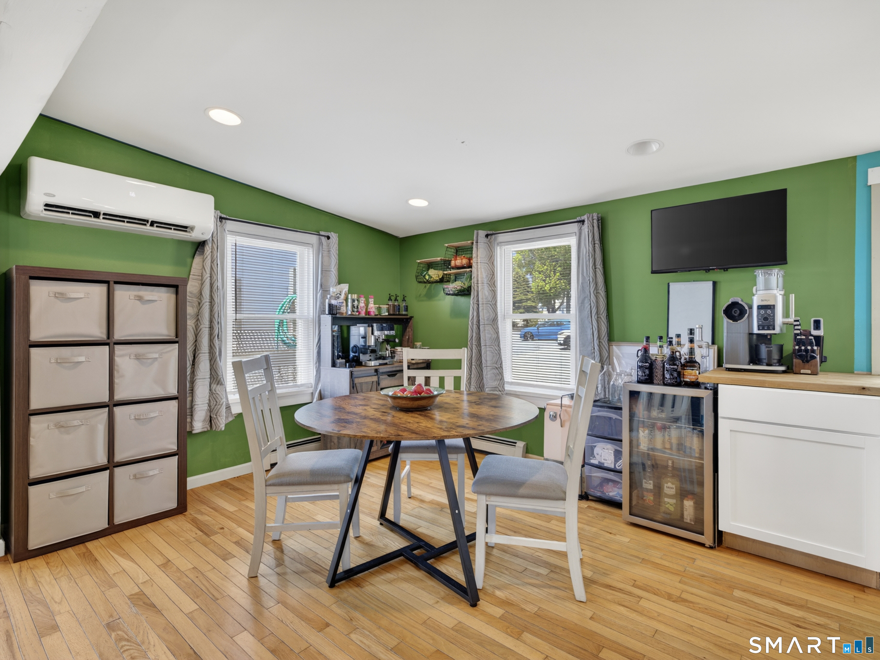 13 Oak Street Groton, CT 06340 - Photo 11 of 38 a view of a dining room with furniture window and wooden floor
