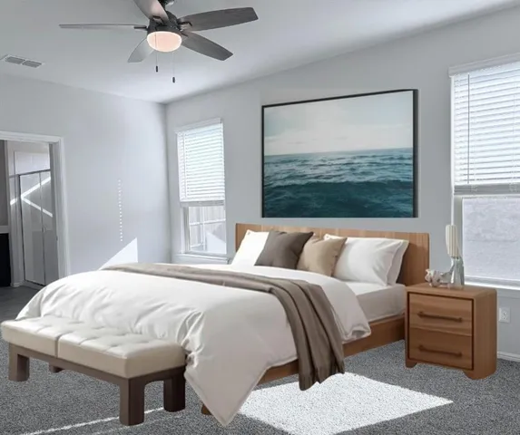 a bedroom with a bed and a dresser