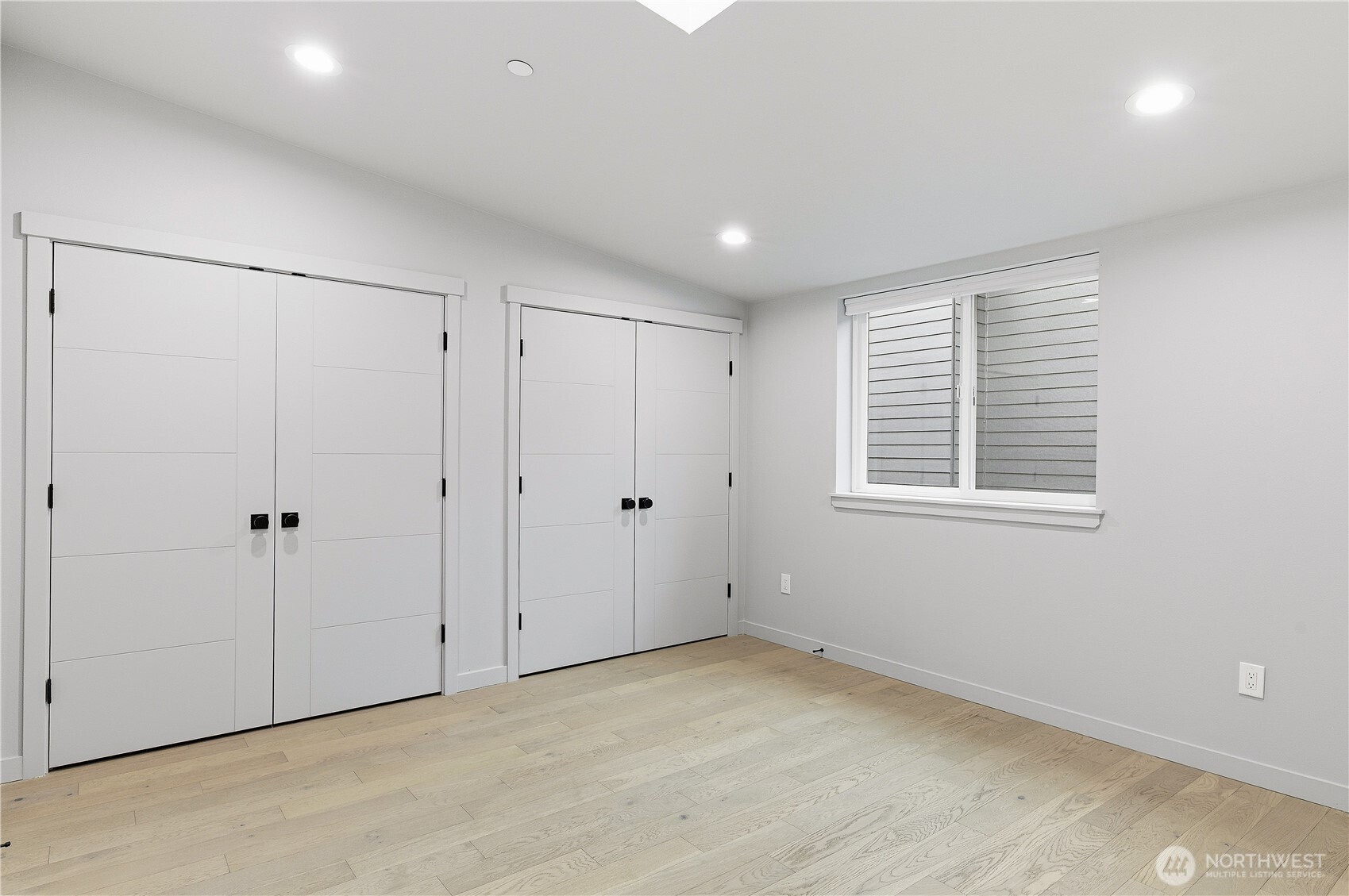 11831 59th Avenue South, Unit B Seattle, WA 98178 - Photo 13 of 19 a view of an empty room with a window