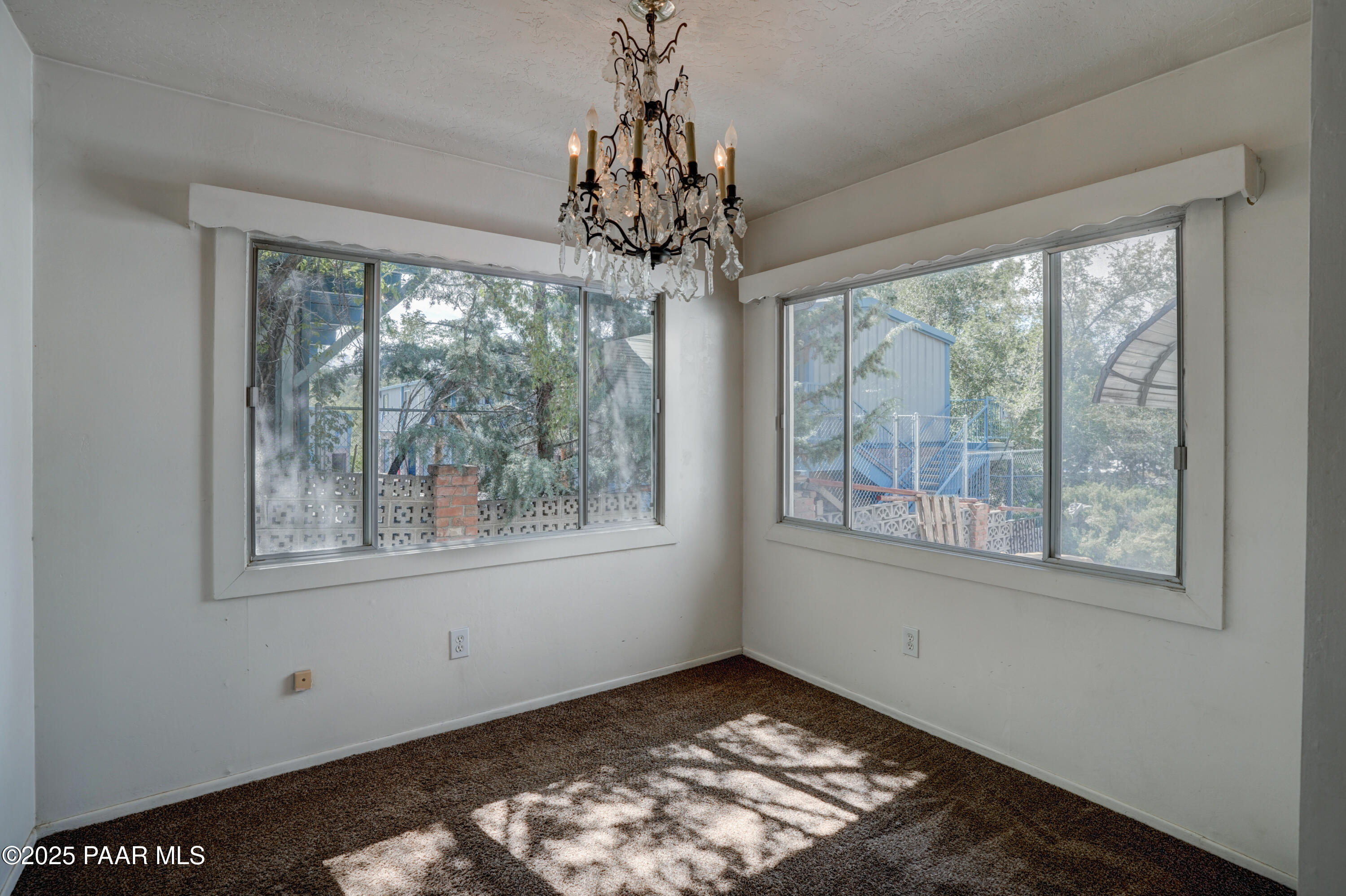 719 Pima Road Prescott, AZ 86303 - Photo 11 of 31 a view of an empty room with a window
