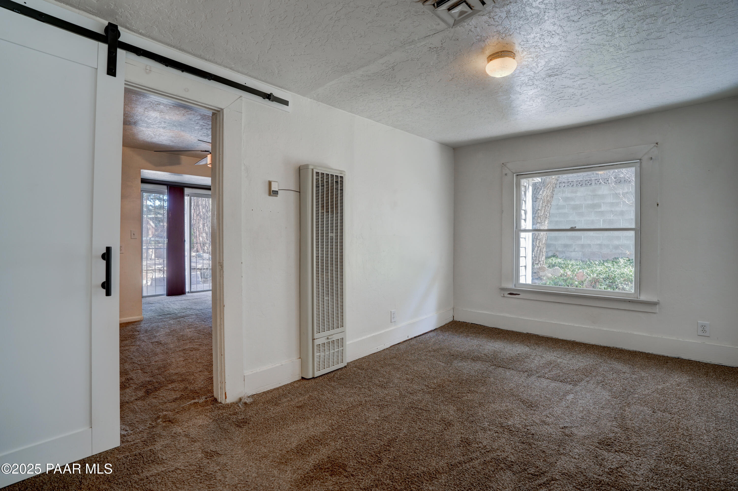 719 Pima Road Prescott, AZ 86303 - Photo 15 of 31 an empty room with windows and closet