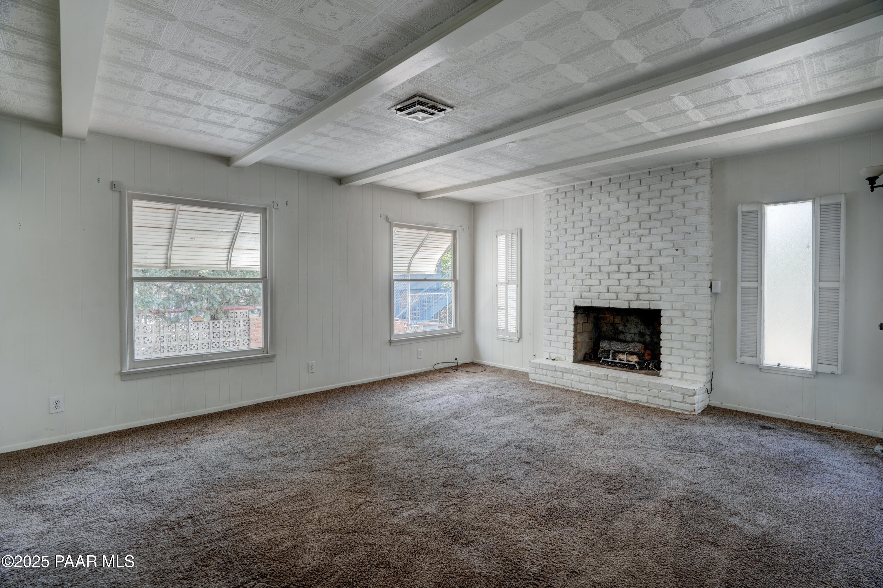 719 Pima Road Prescott, AZ 86303 - Photo 23 of 31 an empty room with windows