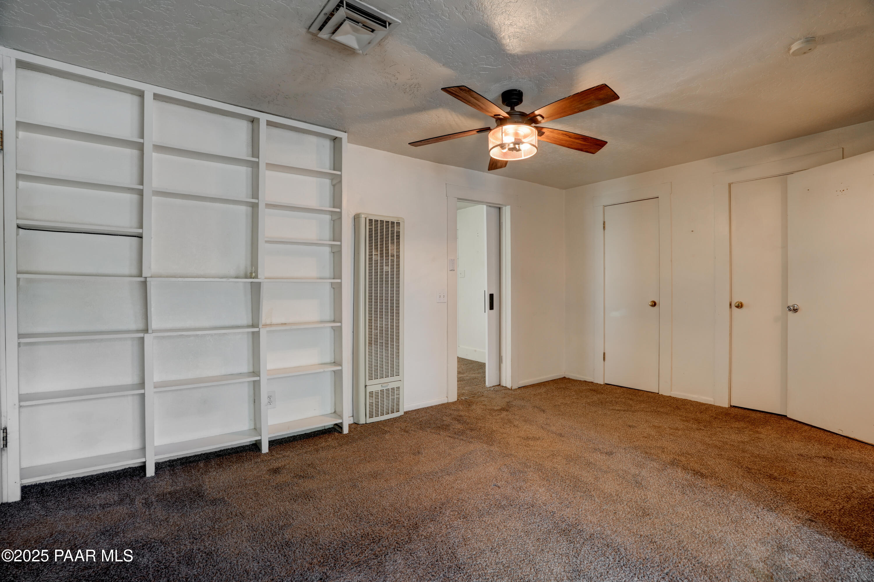719 Pima Road Prescott, AZ 86303 - Photo 28 of 31 a view of an empty room with a window