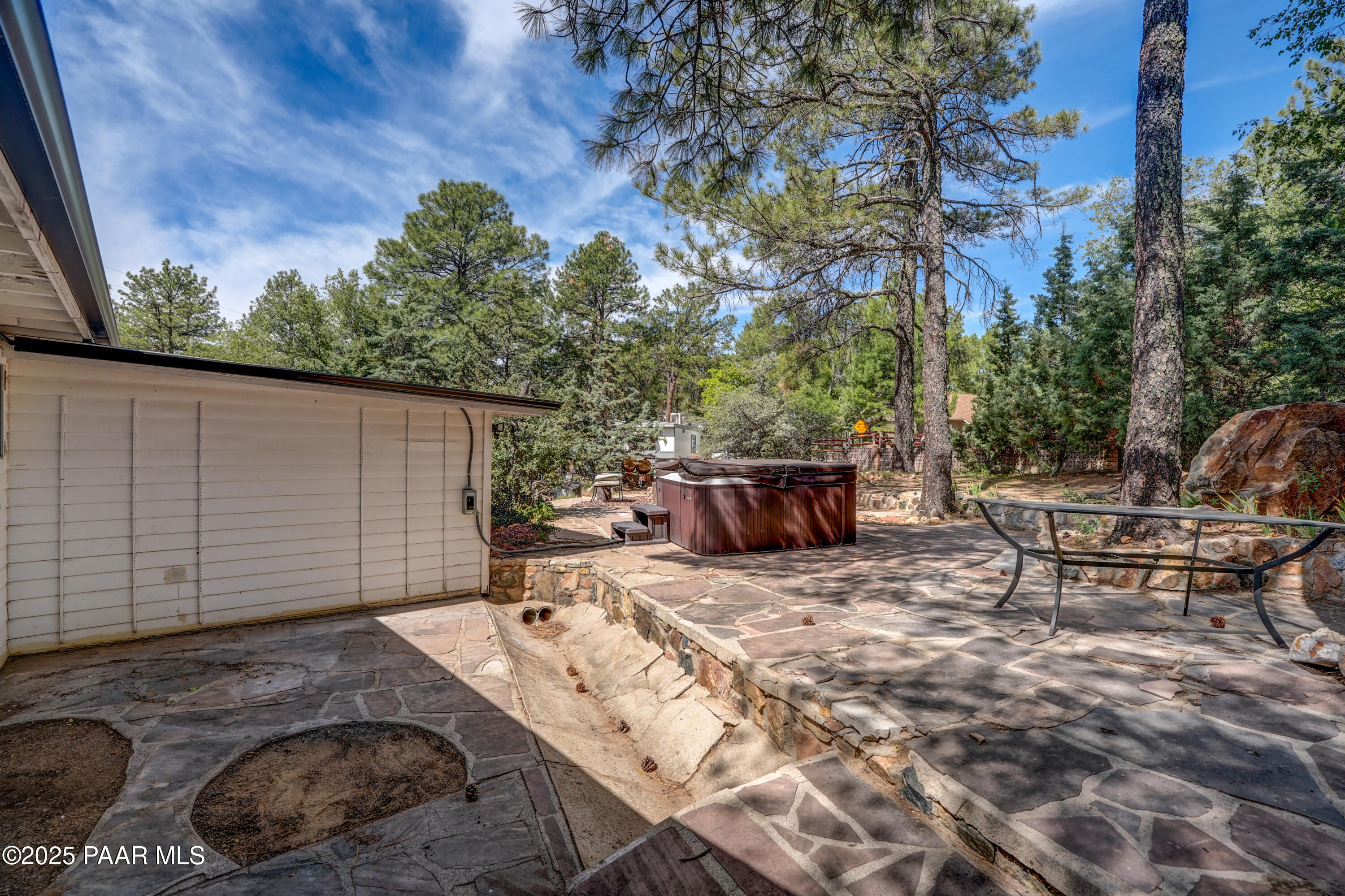 719 Pima Road Prescott, AZ 86303 - Photo 7 of 31 a view of a backyard with sitting area
