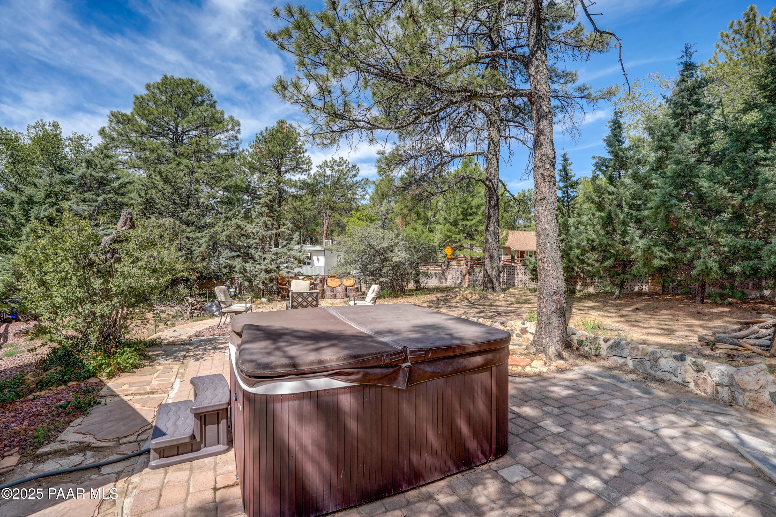 719 Pima Road Prescott, AZ 86303 - Photo 8 of 31 a view of a backyard with wooden fence