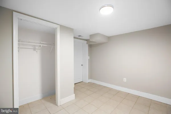 a view of a garden with a tree