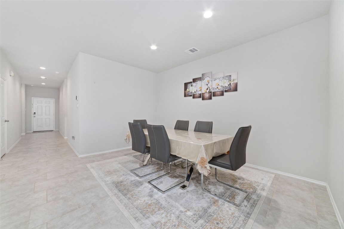 24323 Winchelsea Lane Spring, TX 77389 - Photo 14 of 27 a view of a dining room with furniture