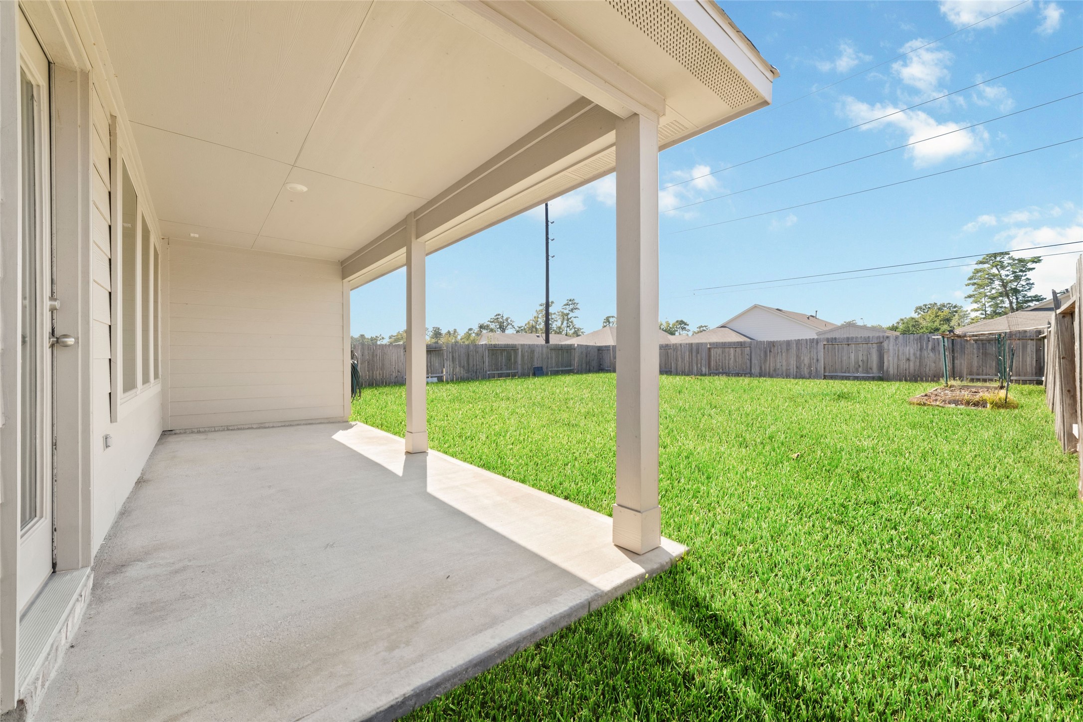 24323 Winchelsea Lane Spring, TX 77389 - Photo 3 of 27 a view of an house with backyard and a garden