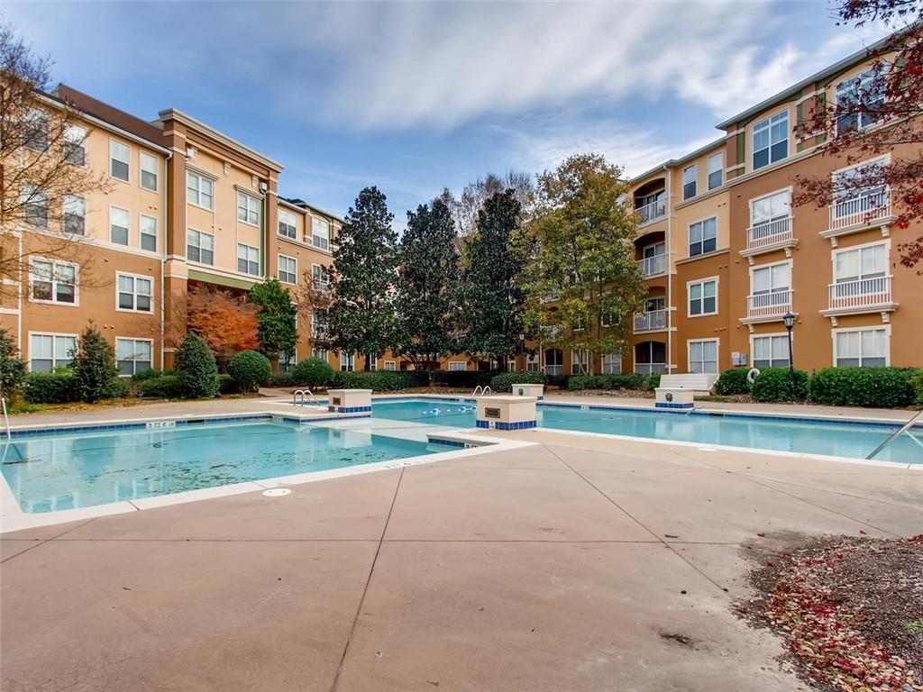 Brookhaven - 10 Perimeter Summit Blvd. #3402 - Top, end unit in Villa Sonoma - the in-ground pool was updated just a couple of years ago. Lovely landscaping year-round