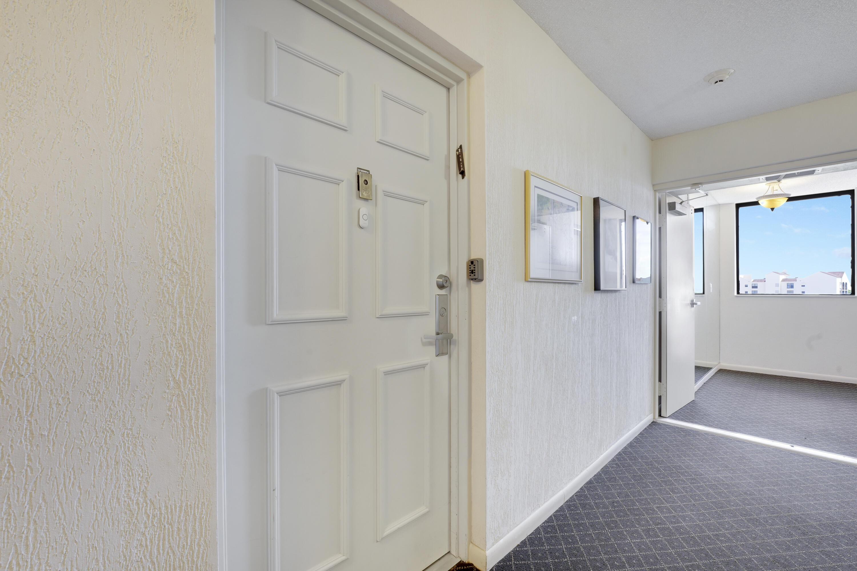 7567 Imperial Drive, Unit 702 Boca Raton, FL 33433 - Photo 3 of 50 Entrance