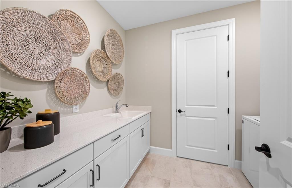 15665 Northridge Road Punta Gorda, FL 33982 - Photo 18 of 49 a bathroom with a granite countertop sink mirror and vanity
